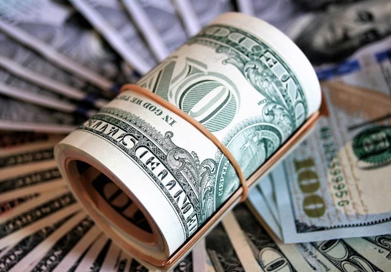 7 Spiritual Meanings of Dreaming of Picking Up Money