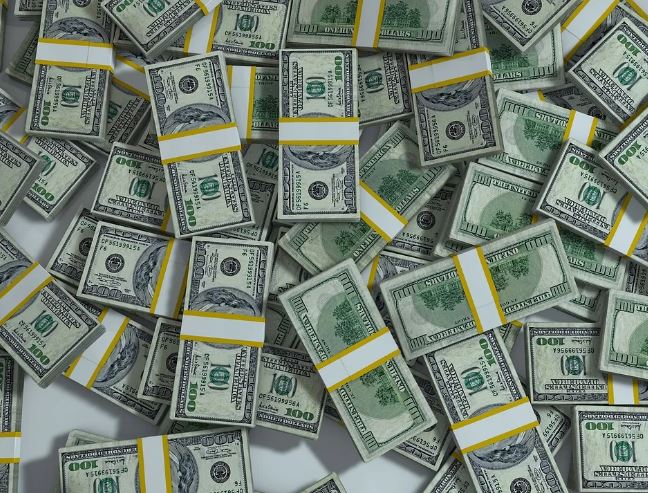 6 Spiritual Meanings of Dreaming of Eating Money