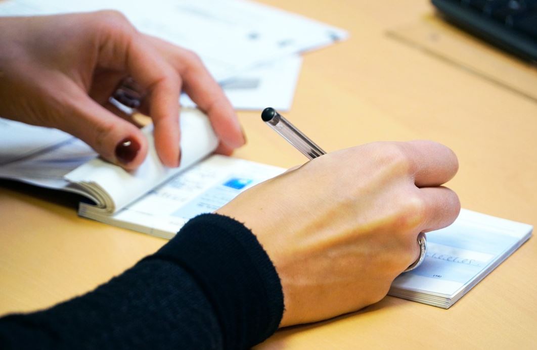 19 Spiritual Meanings of Dreaming About Checks